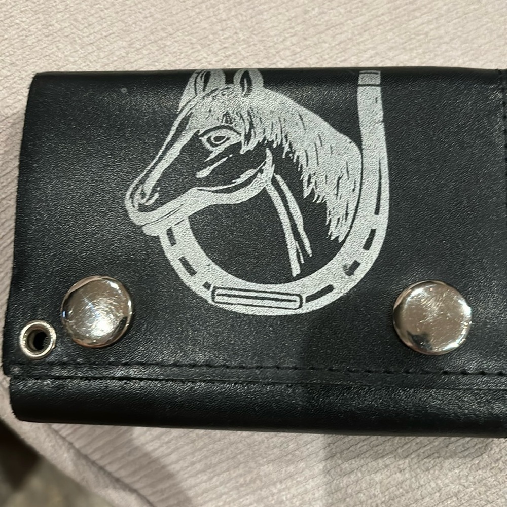 Black wallet with thick leather simple design silver buttons clips shut